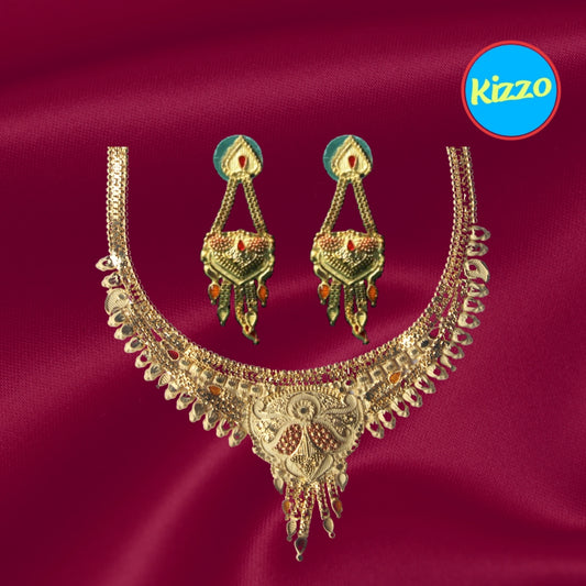 Unique And Trendy Floral Design Gold-Toned Necklace with Intricate Red & Yellow Stone Accents – Perfect for Festive & Bridal Wear