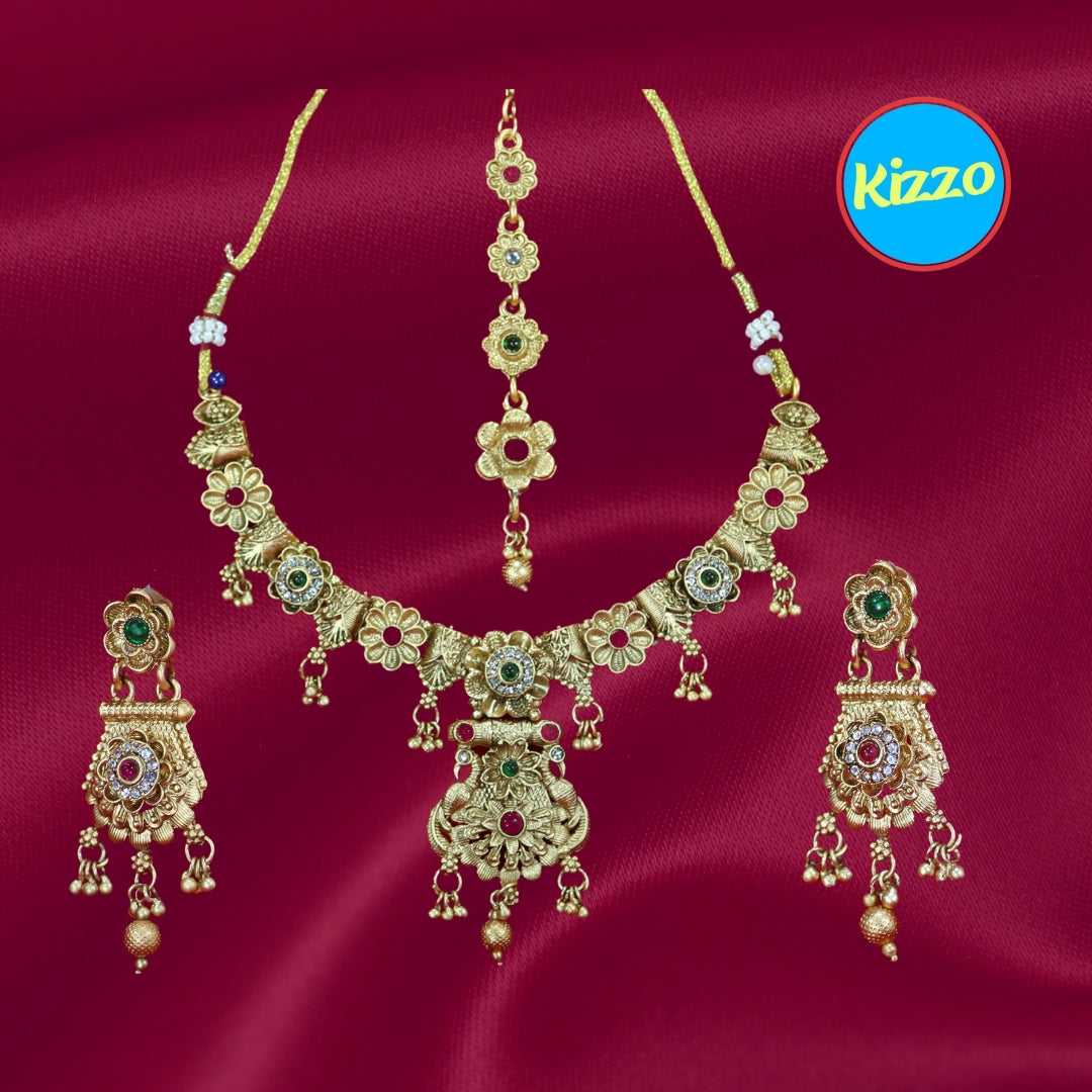 Gold Plated Floral Necklace and Maangtikka Set with Green and Red Stone Embellishments - Traditional Jewelry for Women