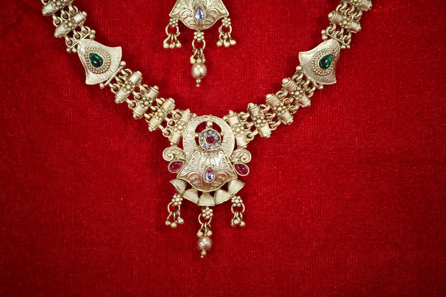 Gold Plated Necklace and Maangtikka Set with Green and Red Stone Embellishments - Traditional Jewelry for Women