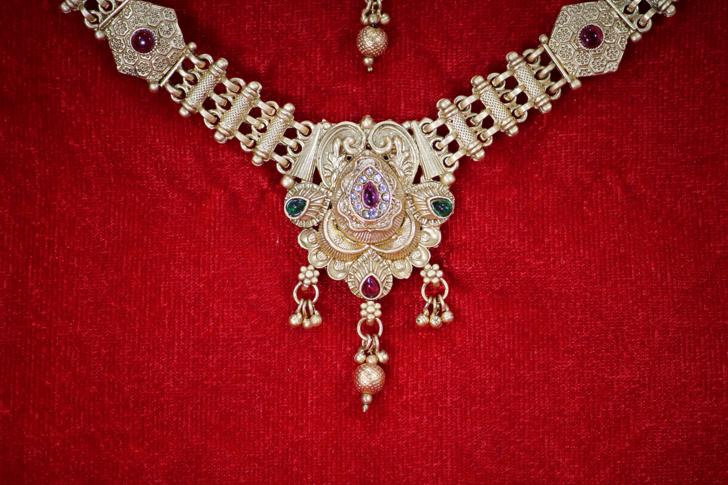 Gold Plated Droplet Necklace and Maangtikka Set with Green and Red Stone Embellishments - Traditional Jewelry for Women