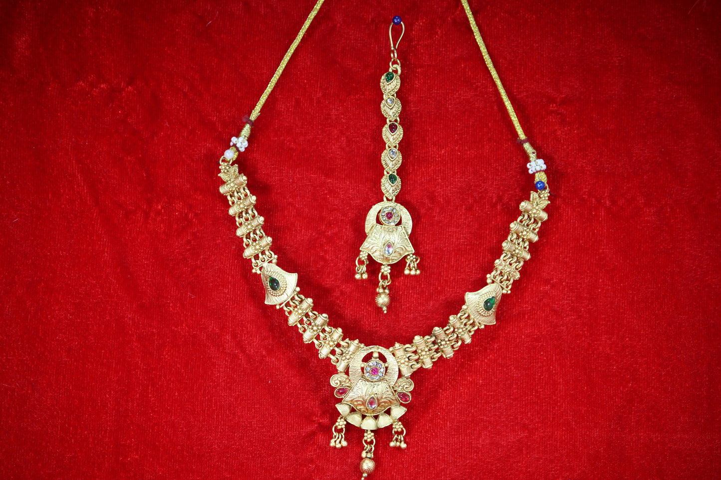 Gold Plated Necklace and Maangtikka Set with Pink, Green and Red Stone Embellishments - Traditional Jewelry for Women