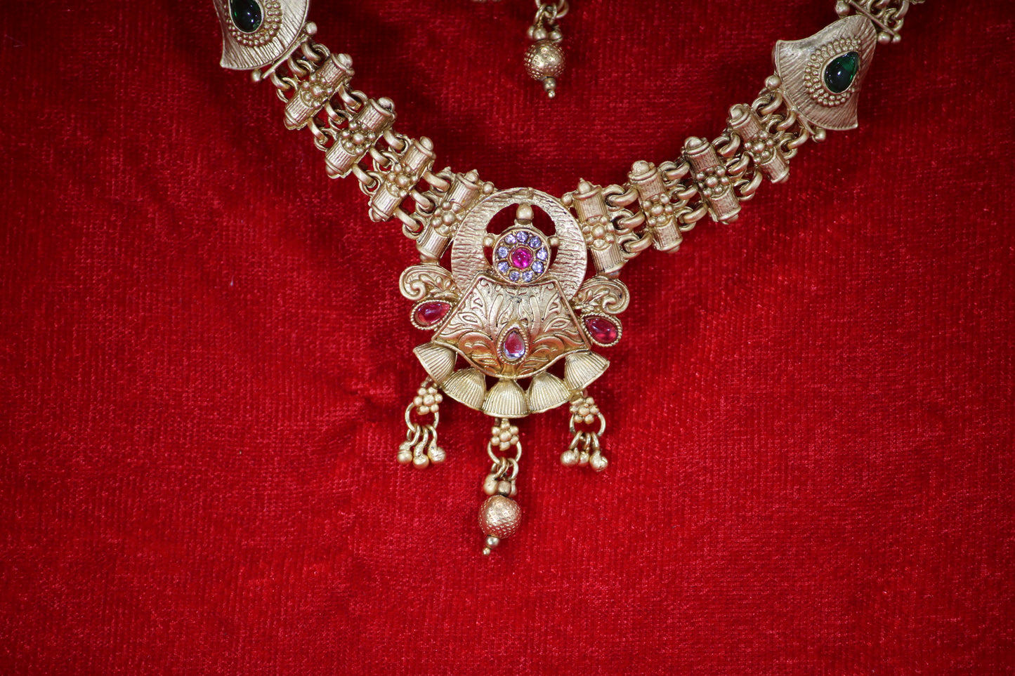 Gold Plated Necklace and Maangtikka Set with Pink, Green and Red Stone Embellishments - Traditional Jewelry for Women