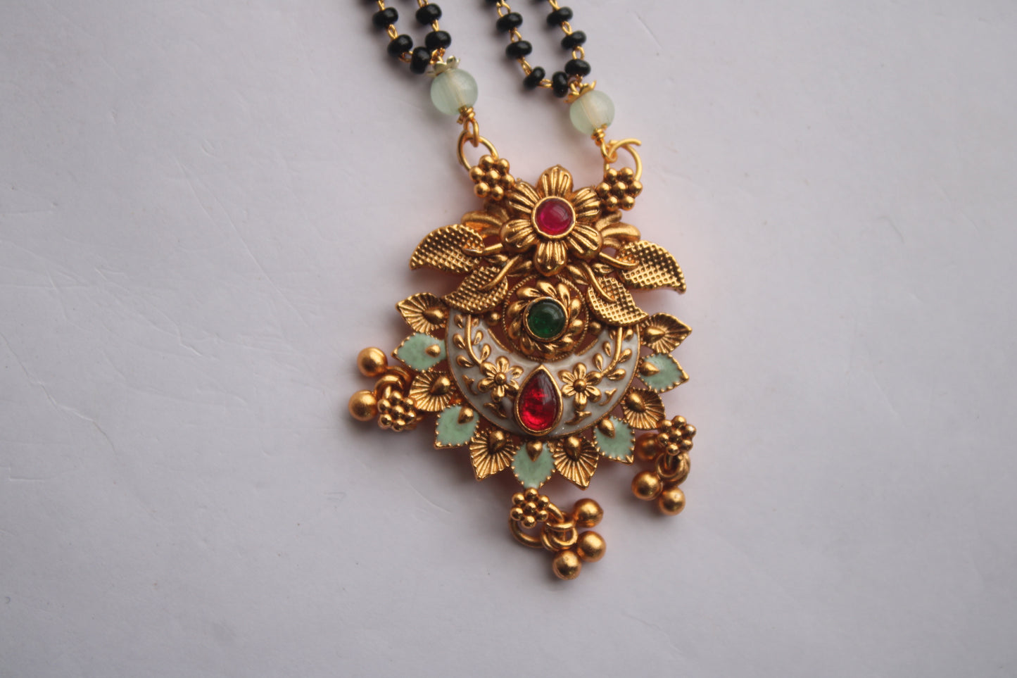 Trendy Half Moon Design Gold Mangalsutra with Ruby & Emerald Accents- Traditional Indian Wedding Jewelry