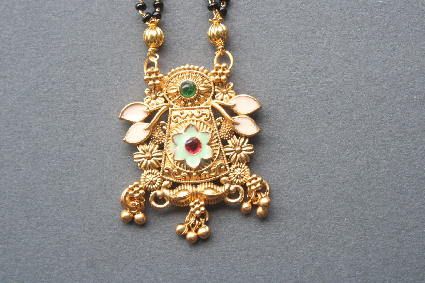 Trendy Floral Design Gold Plated Mangalsutra with Ruby & Emerald Accents- Traditional Indian Wedding Jewelry