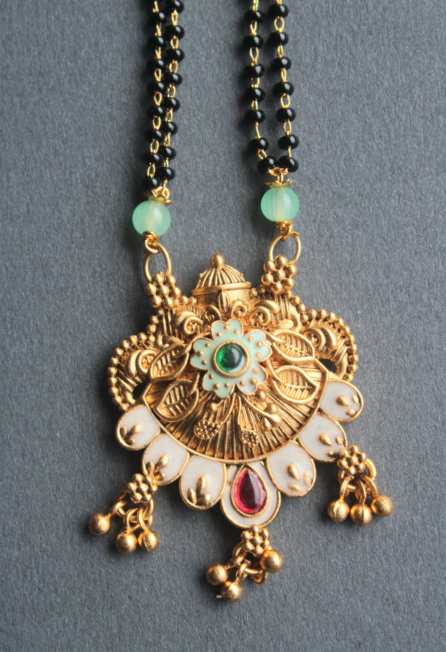 Trendy Floral Design Gold Plated Mangalsutra with Red Ruby & Green Emerald Accents- Traditional Indian Wedding Jewelry