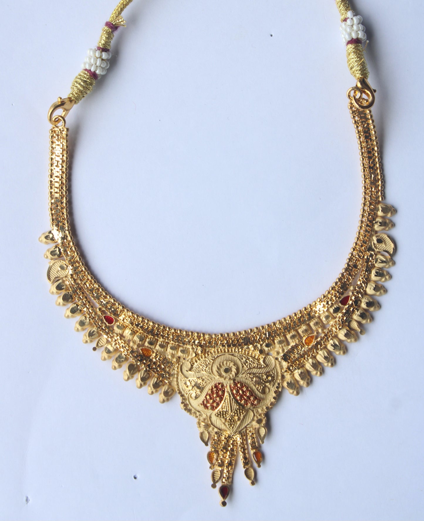 Elegant Traditional Gold-Toned Necklace with Intricate Red Stone Accents – Perfect for Festive & Bridal Wear