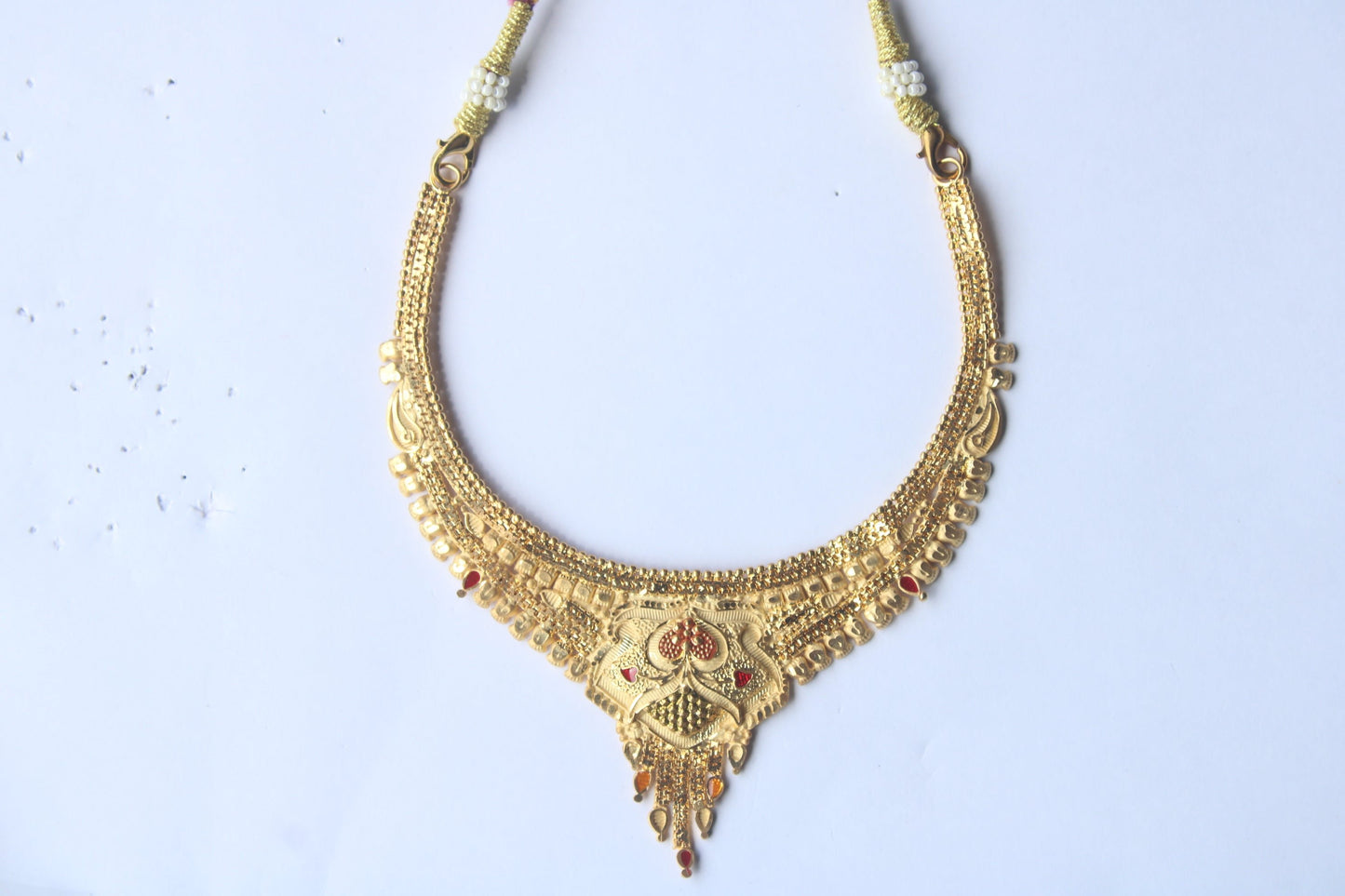 Elegant Traditional Gold-Toned Necklace with Intricate Red Stone Accents – Perfect for Festive & Bridal Wear