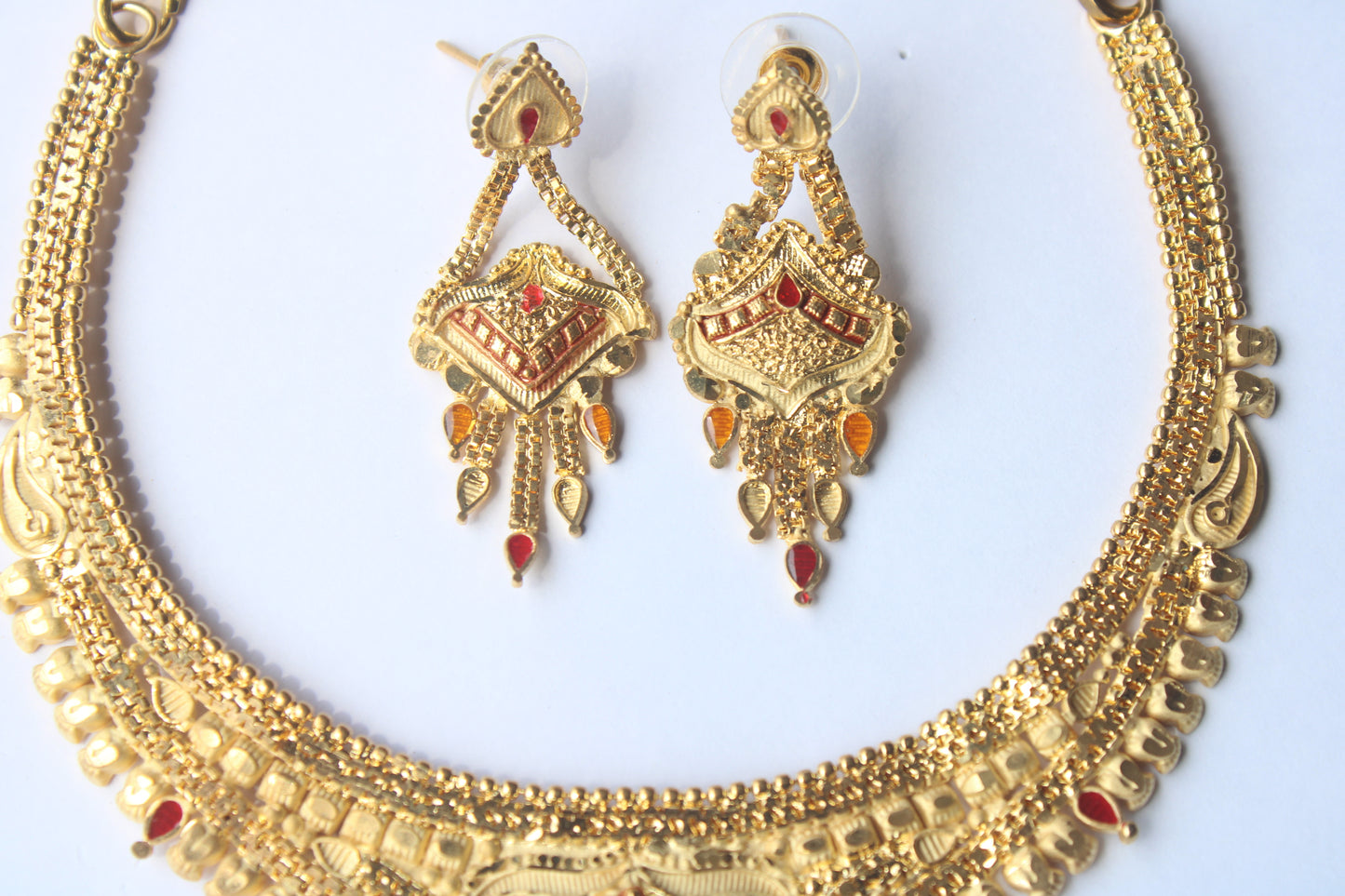 Elegant Traditional Gold-Toned Necklace with Intricate Red Stone Accents – Perfect for Festive & Bridal Wear